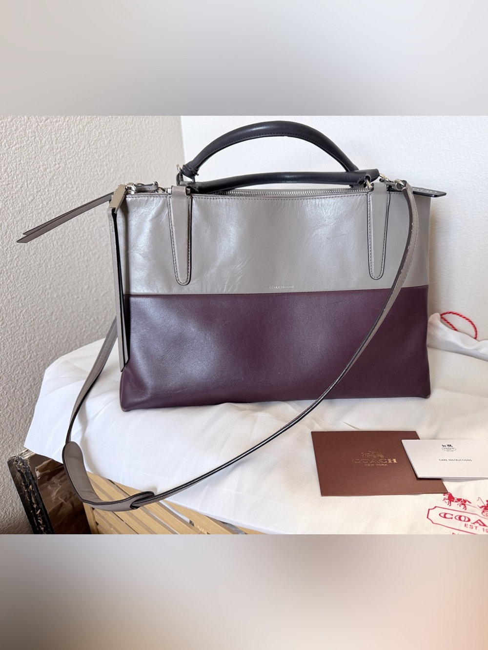 Coach Colorblock Leather Borough Bag in a striking grey and burgundy oxblood